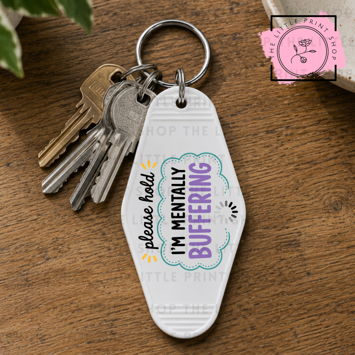 Buffering - UV DTF Motel Keyring Decal